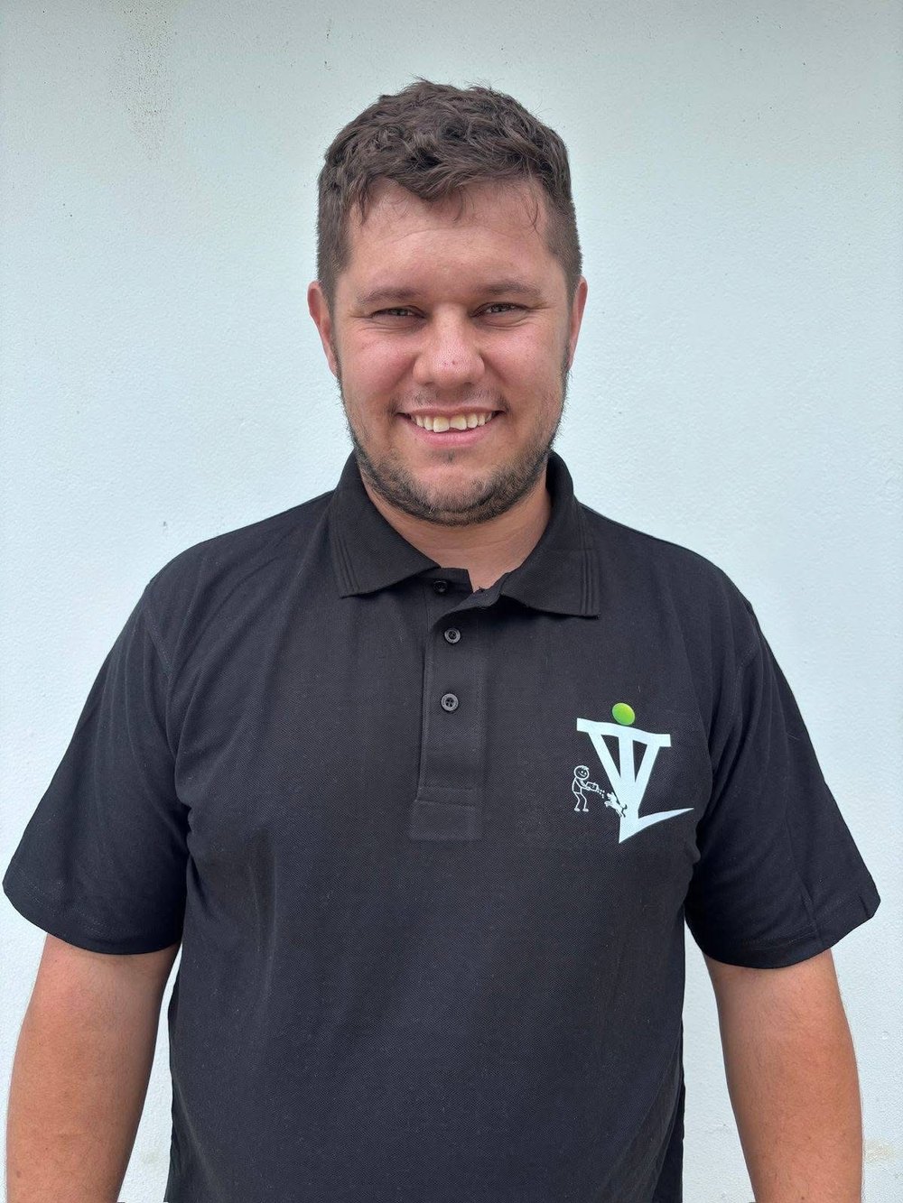 Greg in his black Vito Dog School shirt